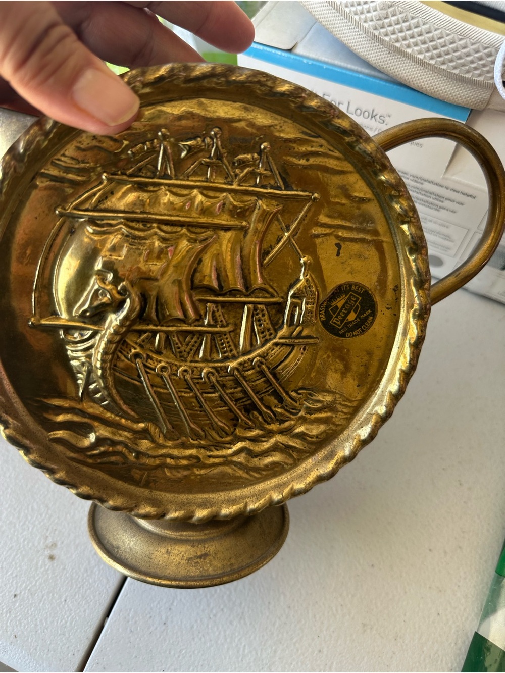 Vintage peerage brass pitcher features a distinctive embossed Viking ship on it